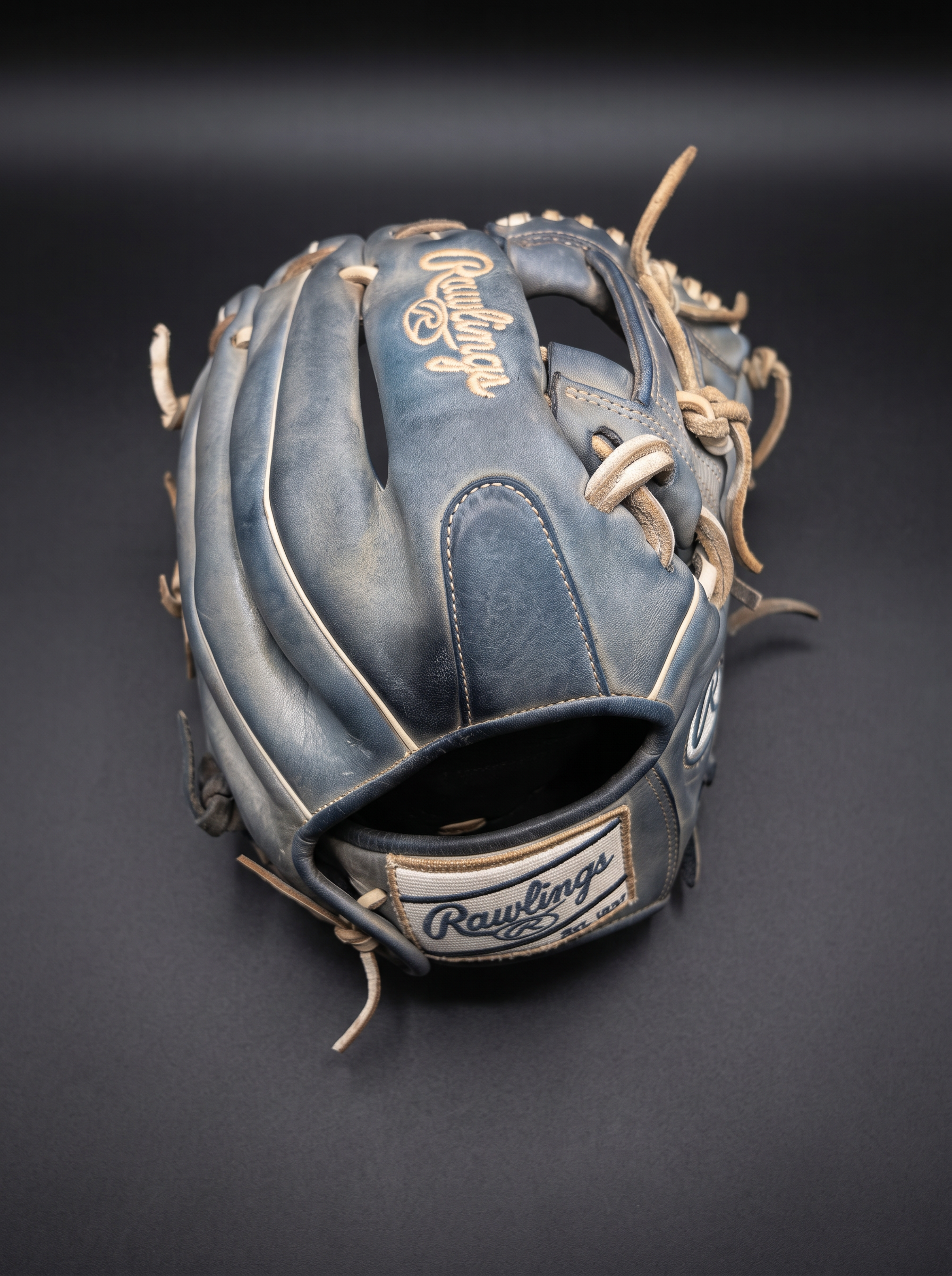 Rawlings blue glove — lace repair needed